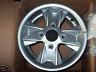 JANTE ARRIERE  QUAD SYM 600 DELUXE NEUVE 4X110